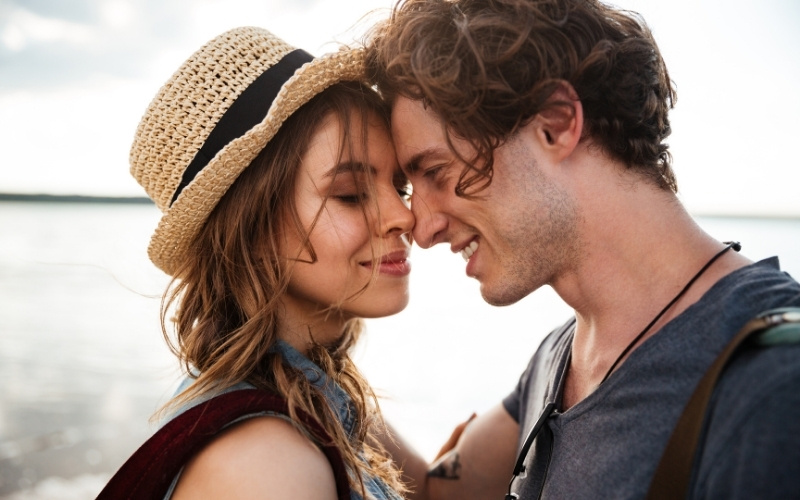 2 lovers embrace on Valentine's day on the beach